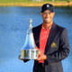Tiger Woods with trophy after Sunday's victory (David Cannon/Getty Images)